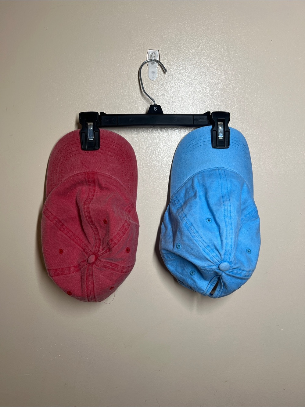 Two ball caps- red and blue